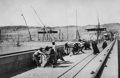 Opening the Sluices on the Nile Dam, 1906 by English Photographer